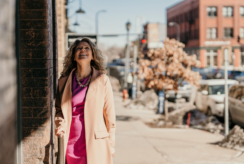 Michelle Barringer looking up to the sky and smiling.