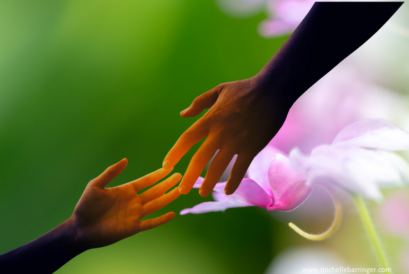 One hand reaching to another - Michelle Barringer blog
